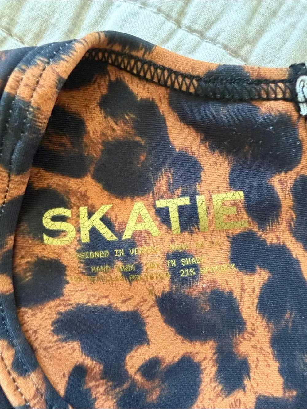 Skatie Leopard Print Long-Sleeve One-Piece - Brown/Black